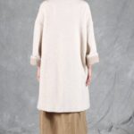BRISE long winter coat sewing pattern in a garment photograph, emphasizing the dropped shoulder line, straight relaxed cut and open outerwear silhouette.
