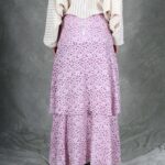 Full-length back view of the BOHEME floral maxi skirt sewing pattern, displaying the waistband, overlapping hip flounce and long flowing hem.