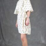COSMOS batwing-sleeve tunic sewing pattern: the soft lower edge follows the fluid fall of the fabric. The look is designed for lightweight, flowing fabric.
