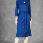 PALOMA midi dress sewing pattern with princess seams, a round neckline and three-quarter sleeves.