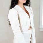 Bolero jacket sewing pattern GINA: cream bolero with gathered shoulders and long sleeves, matching wide pants, bright interior