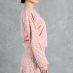 THAIS zip-front jacket sewing pattern — gallery photograph of the short jacket worn with a matching patterned skirt, the closure creating a strong vertical line.