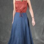 Boho skirt sewing pattern ROMY: looking down, fullness of the long denim skirt and tied rust top