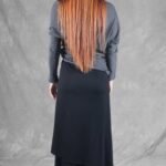 LE SILENCE DU VENT pants with skirt overlay sewing pattern: back view of the black wide-leg trousers and long asymmetrical panel.