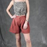 Women’s MILA PDF blouse sewing pattern, a comfortable loose-fitting summer top with a distinctive crossover back and a waist sash that can wrap around the body.