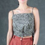 MILA beginner-friendly sleeveless top sewing pattern PDF, featuring light gathers below the bust and a long tie belt for a customizable summer silhouette.