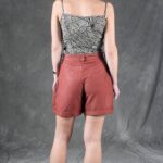 Sew your own MILA summer blouse with this PDF sewing pattern: a relaxed sleeveless top with crossed-back styling and neat bias-bound edges.