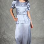Vintage-inspired silver satin dress featuring front pintucks and peplum detail, sewn using a flair dress sewing pattern.