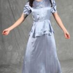 Elegant handmade dress with short puff sleeves, shiny satin fabric, and peplum silhouette, created from an elegant dress sewing pattern