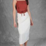 CHARLIZE women’s midi skirt sewing pattern: full-length front view of a white straight skirt with a high waist.