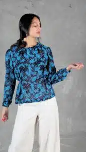 Full body view of Agathe blouse, paired with cream pants – modern handmade look using a long sleeve blouse sewing pattern