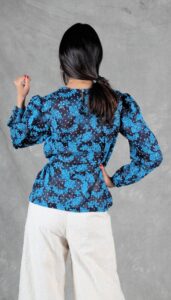 Back view of the Agathe blouse, with keyhole closure and puffed shoulders – feminine blouse sewing pattern with back detail.