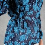 AGATHE blouse sewing pattern: close-up of the elastic shirring at the waist of the navy blouse with turquoise motifs.