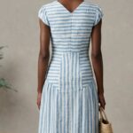 BELLA dress sewing pattern: back view of the blue-and-white striped summer dress, showing the V-shaped back neckline.