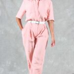 EMMA women’s jumpsuit sewing pattern in pink linen with front trouser pleats, a shirt collar and side pockets.