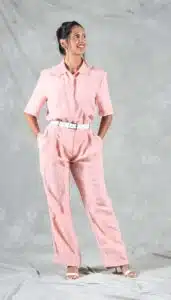 Handmade women’s jumpsuit in blush pink linen, featuring a hidden button placket, tailored waist, and soft structure – ideal for a utility-inspired jumpsuit sewing pattern.