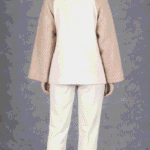 Back view of the JOY raglan jacket sewing pattern, with cream back panel, beige sleeves and high stand collar.
