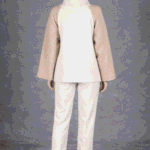 JOY women’s jacket sewing pattern photographed from behind, with cream back panel and contrasting beige raglan sleeves.