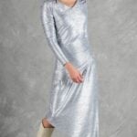HYPE dress sewing pattern: silver long-sleeved dress in shiny fabric, shown from the side
