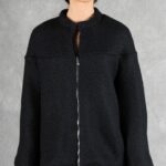 LYNN women’s zip-up jacket sewing pattern: straight-on view of the loose black jacket with long sleeves and central zipper.