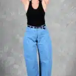 BALLOON high-waisted barrel pants sewing pattern in light blue denim, front view showing the relaxed curved-leg silhouette.