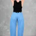 BALLOON balloon-leg jeans sewing pattern photographed from behind, highlighting the relaxed high-waisted fit.