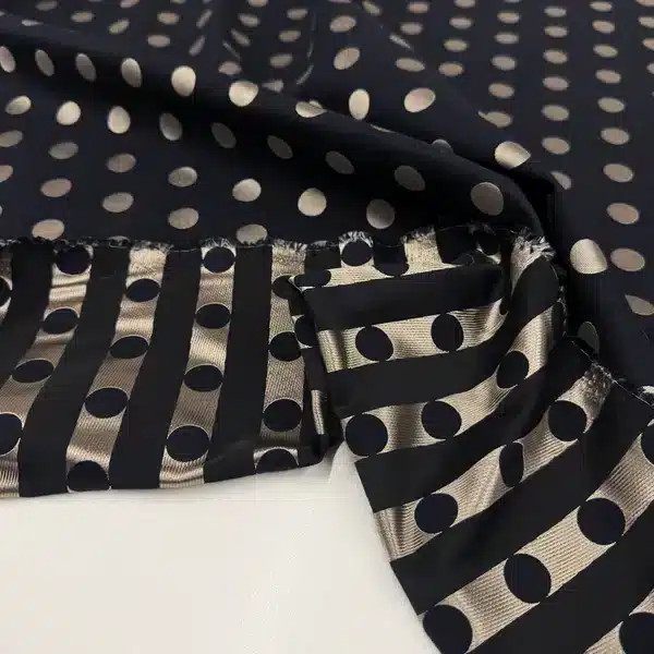 Jacquard azul marino con lunares dorado champán y reverso de rayas tejidas - Torretto Tessuti