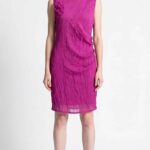 NAIA draped dress sewing pattern, front view of the fuchsia sleeveless knee-length dress with soft diagonal pleats.