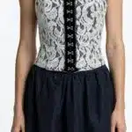 Close-up of the ECLIPSE corset bustier sewing pattern, showing the sweetheart neckline and black hook-and-eye front closure.