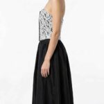 Side view of the ECLIPSE bustier sewing pattern in black-and-white floral lace, showing the fitted strapless silhouette.