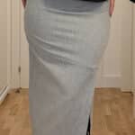 GRACE pencil skirt sewing pattern — editorial outfit photograph featuring the GRACE asymmetrical pencil skirt styled as a modern midi-length garment.